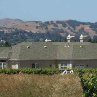 Large home with new shingles installed