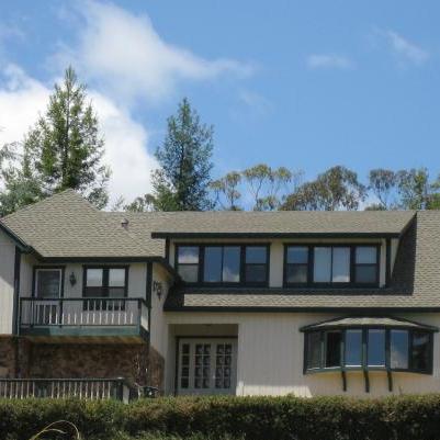 Large home with new shingles installed